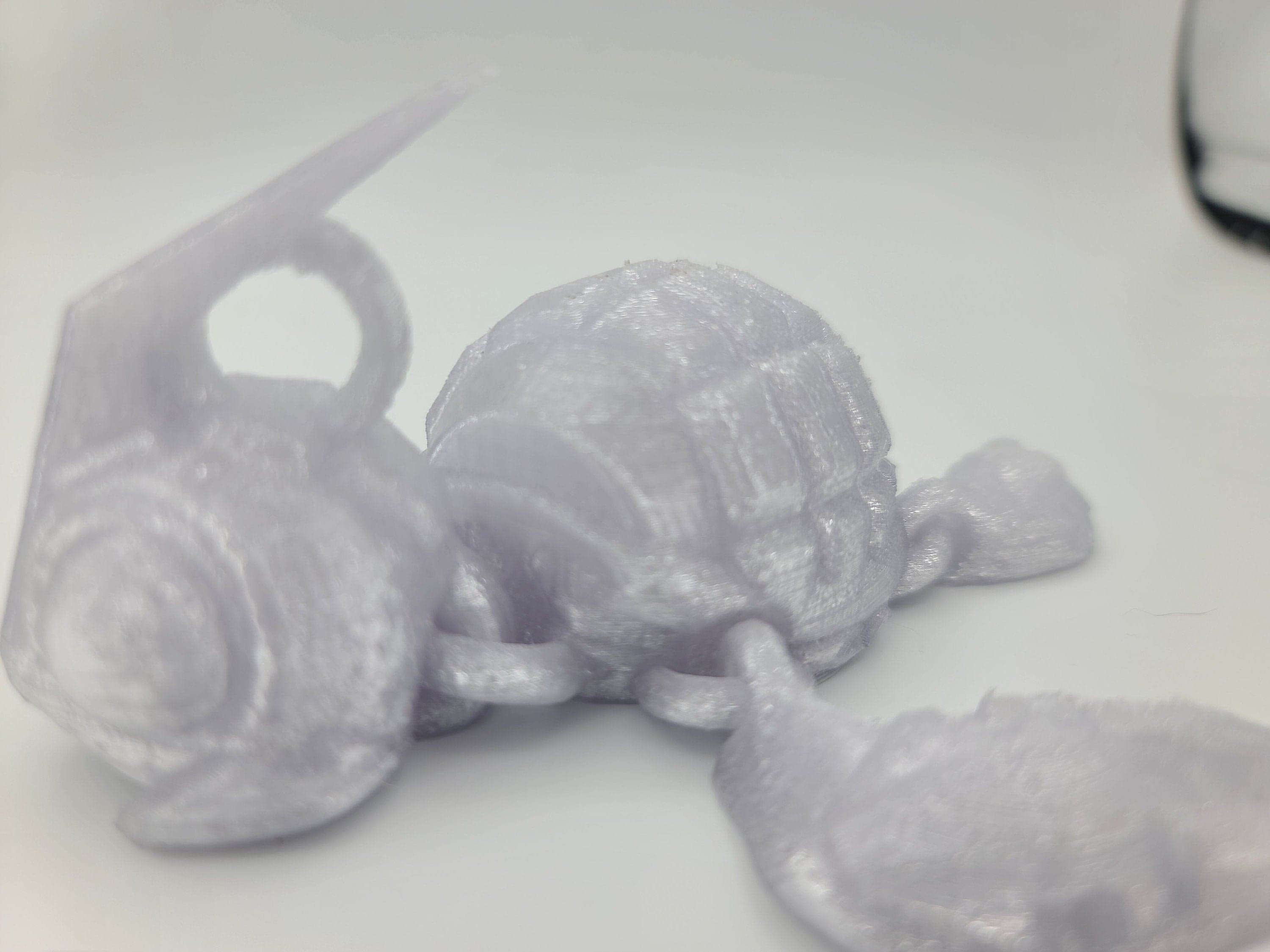 Silver shimmer turtle articulating (Grenurtle) link head. 3D printed. Flexi fidget turtle, (made) adult desk fidget toy. perfect gift