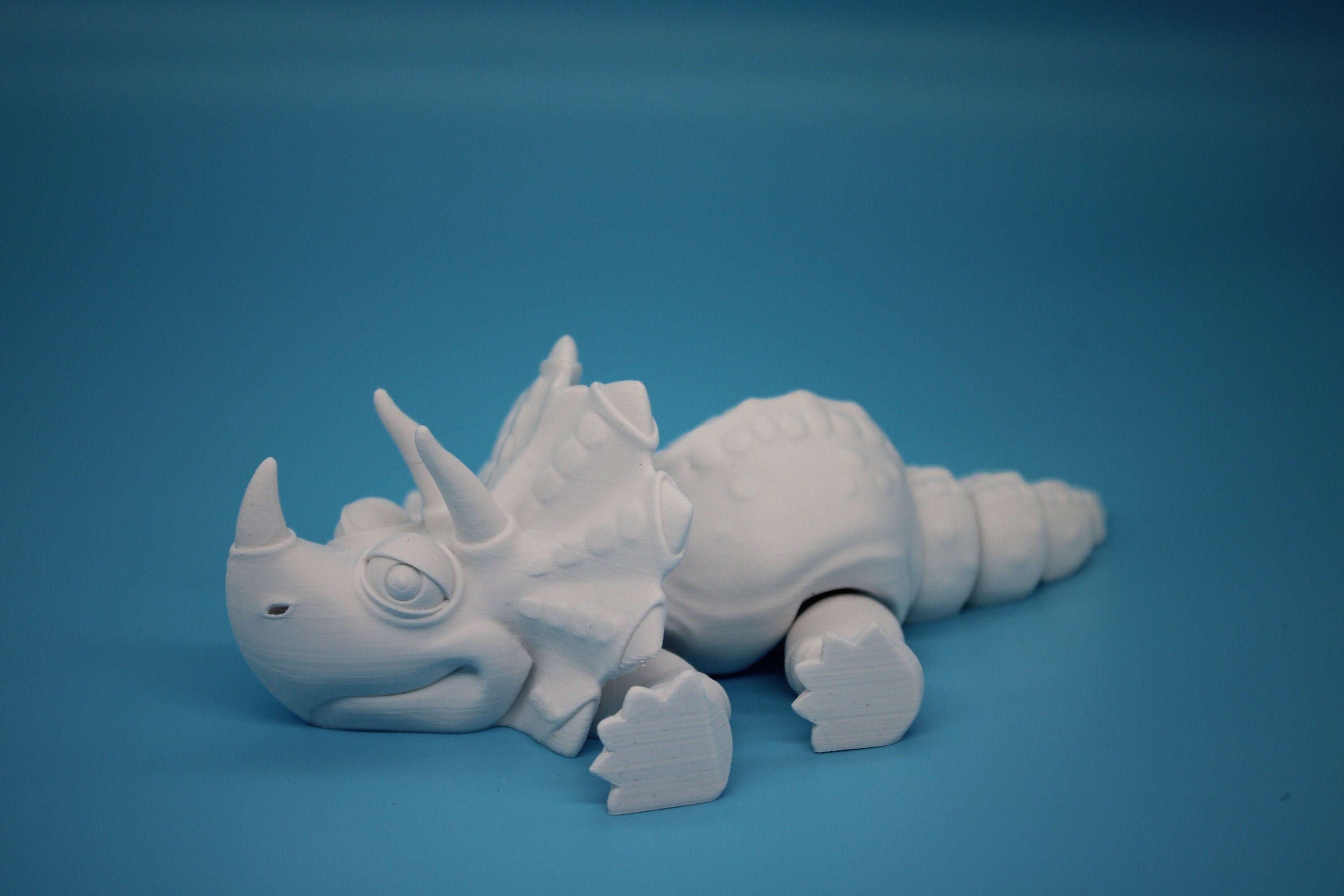 Cute Flexi White Triceratops. Unique 3D printed Triceratops. Great Articulating fidget toy, desk, sensory toy. 6.5 inch