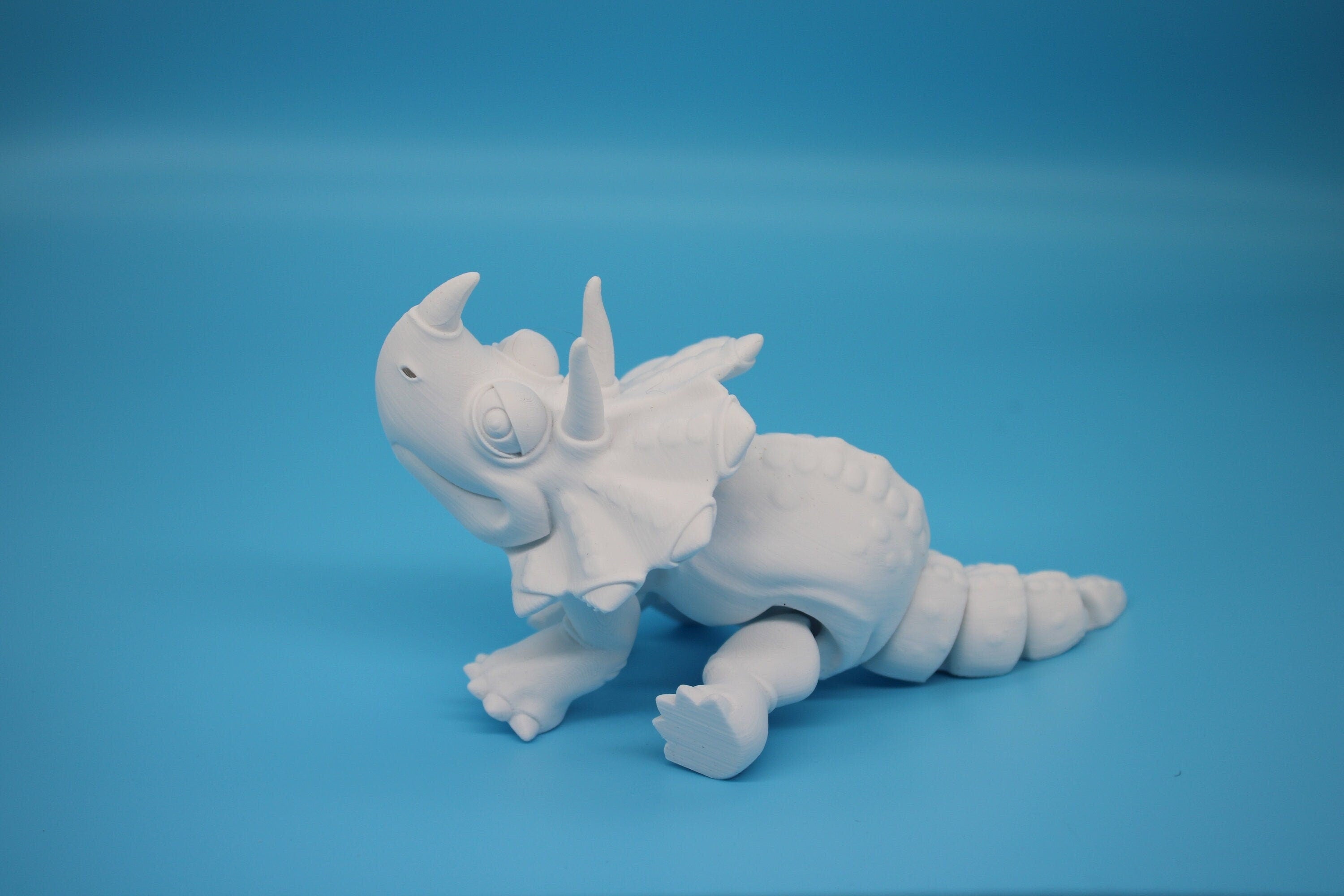 Cute Flexi White Triceratops. Unique 3D printed Triceratops. Great Articulating fidget toy, desk, sensory toy. 6.5 inch