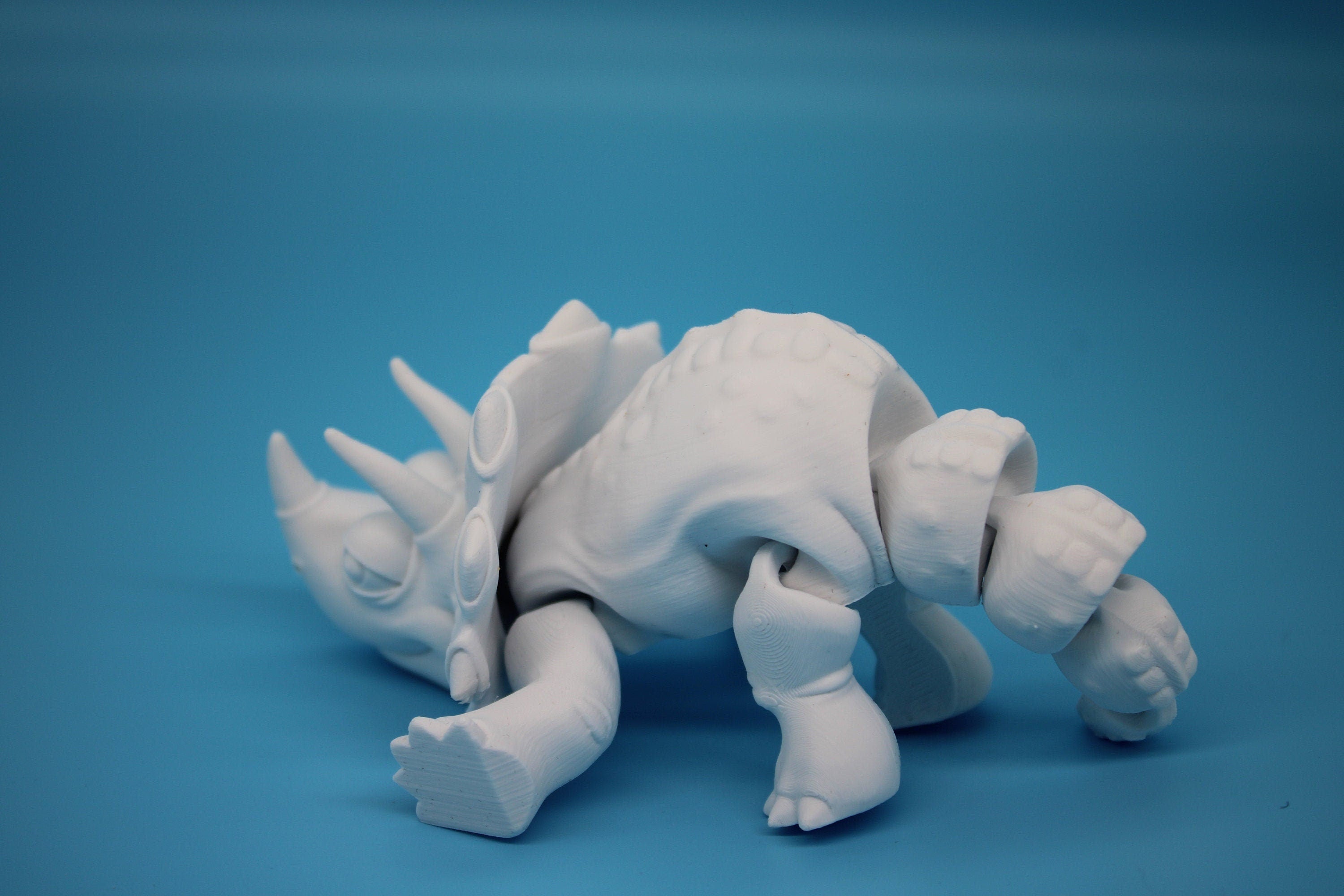 Cute Flexi White Triceratops. Unique 3D printed Triceratops. Great Articulating fidget toy, desk, sensory toy. 6.5 inch