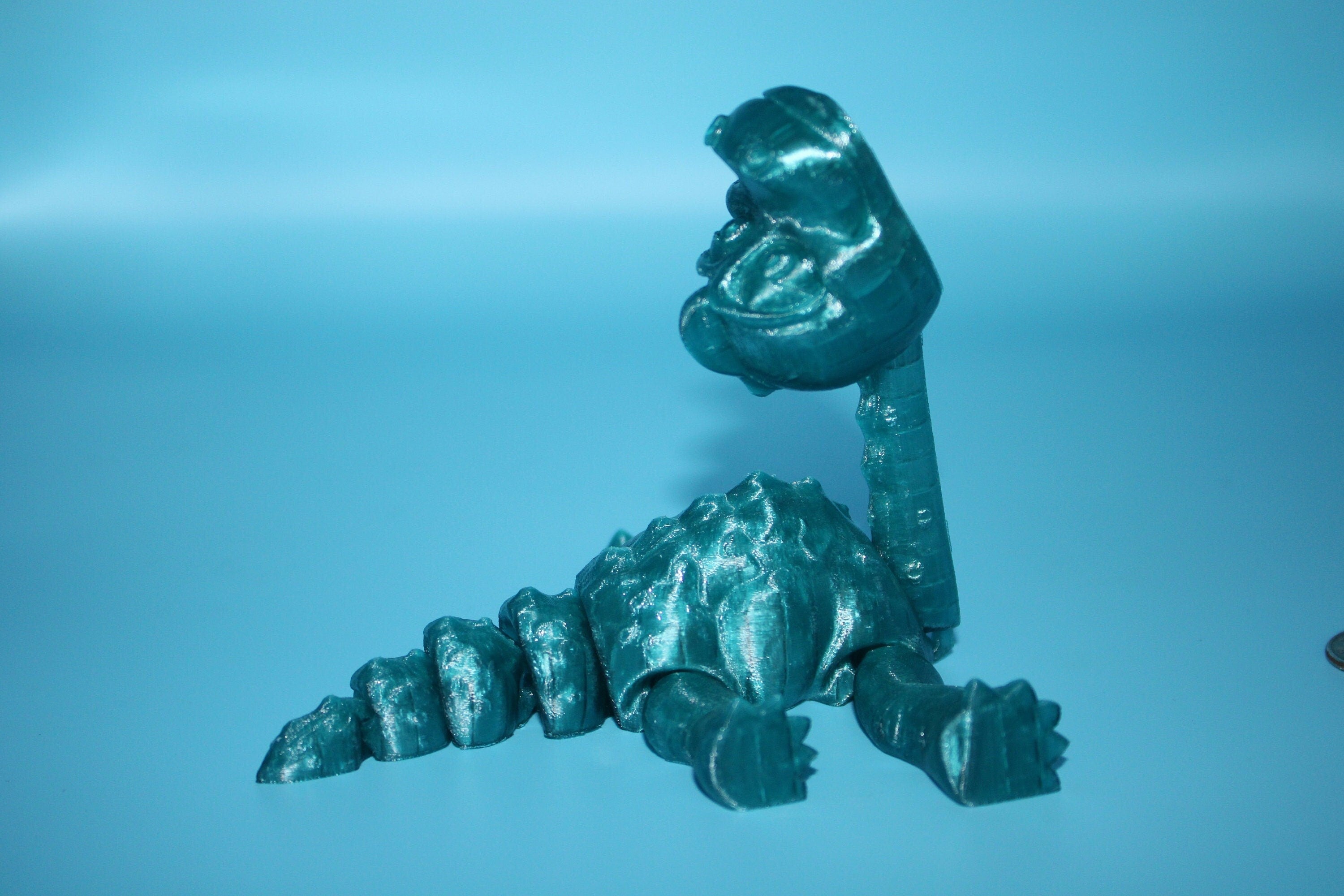 Teal Translucent Brachiosaurus. Cute Flexi Articulating Dinosaur. 3D printed unique dino. Great fidget toy, buddy, desk art / toy. 9 in.