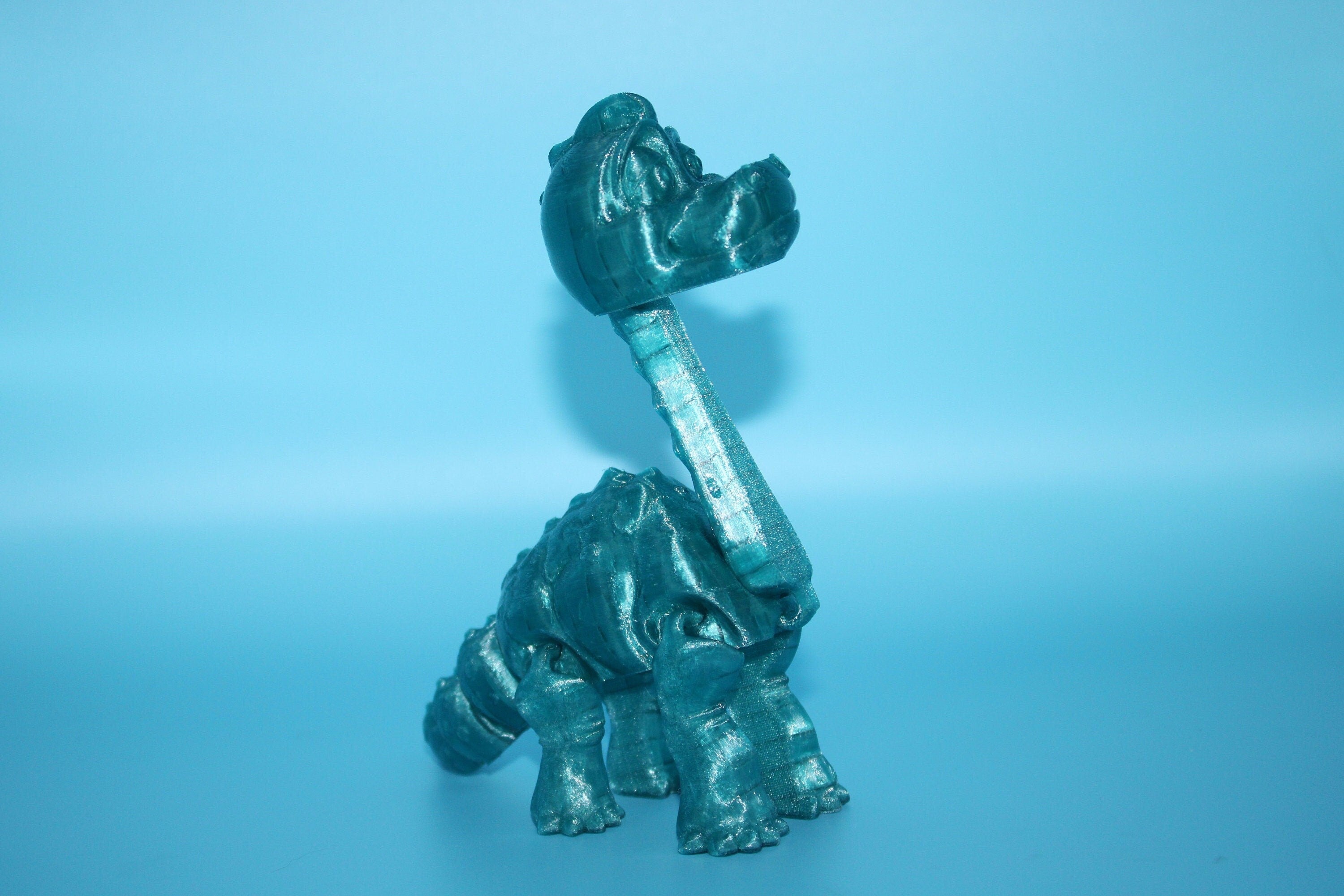 Teal Translucent Brachiosaurus. Cute Flexi Articulating Dinosaur. 3D printed unique dino. Great fidget toy, buddy, desk art / toy. 9 in.