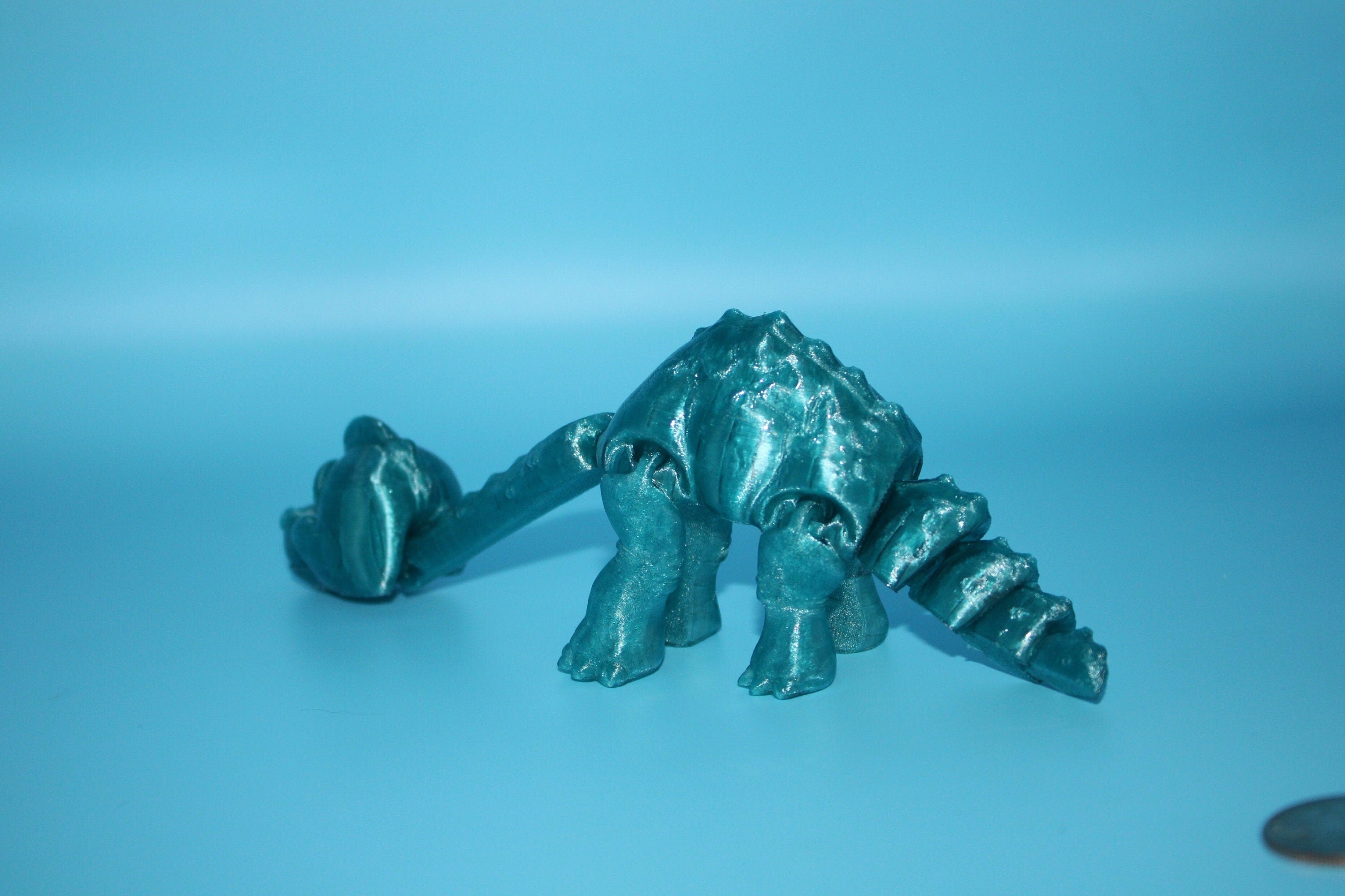 Teal Translucent Brachiosaurus. Cute Flexi Articulating Dinosaur. 3D printed unique dino. Great fidget toy, buddy, desk art / toy. 9 in.