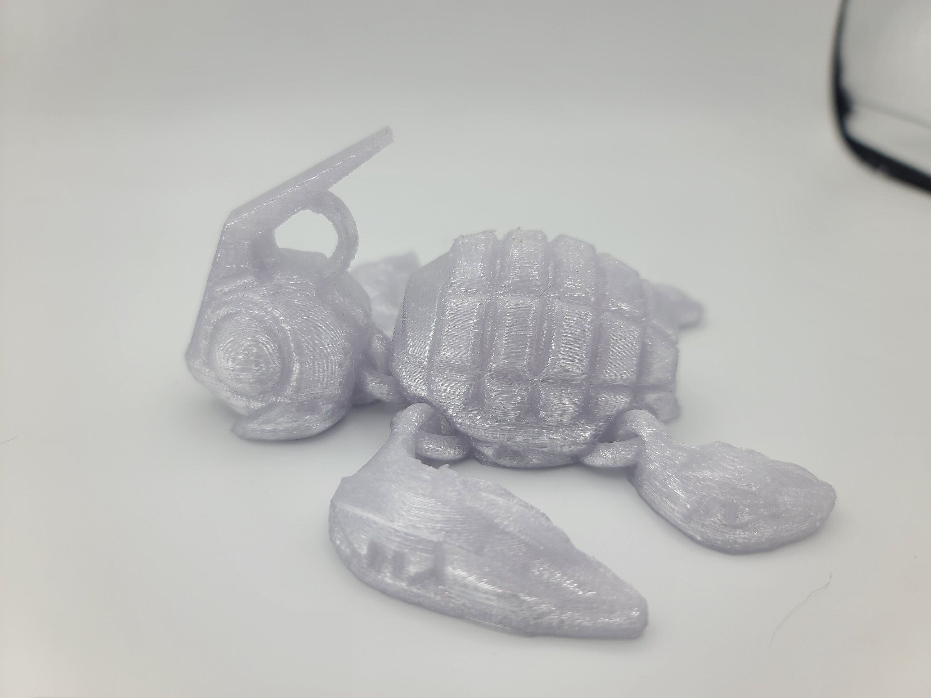 Silver shimmer turtle articulating (Grenurtle) link head. 3D printed. Flexi fidget turtle, (made) adult desk fidget toy. perfect gift