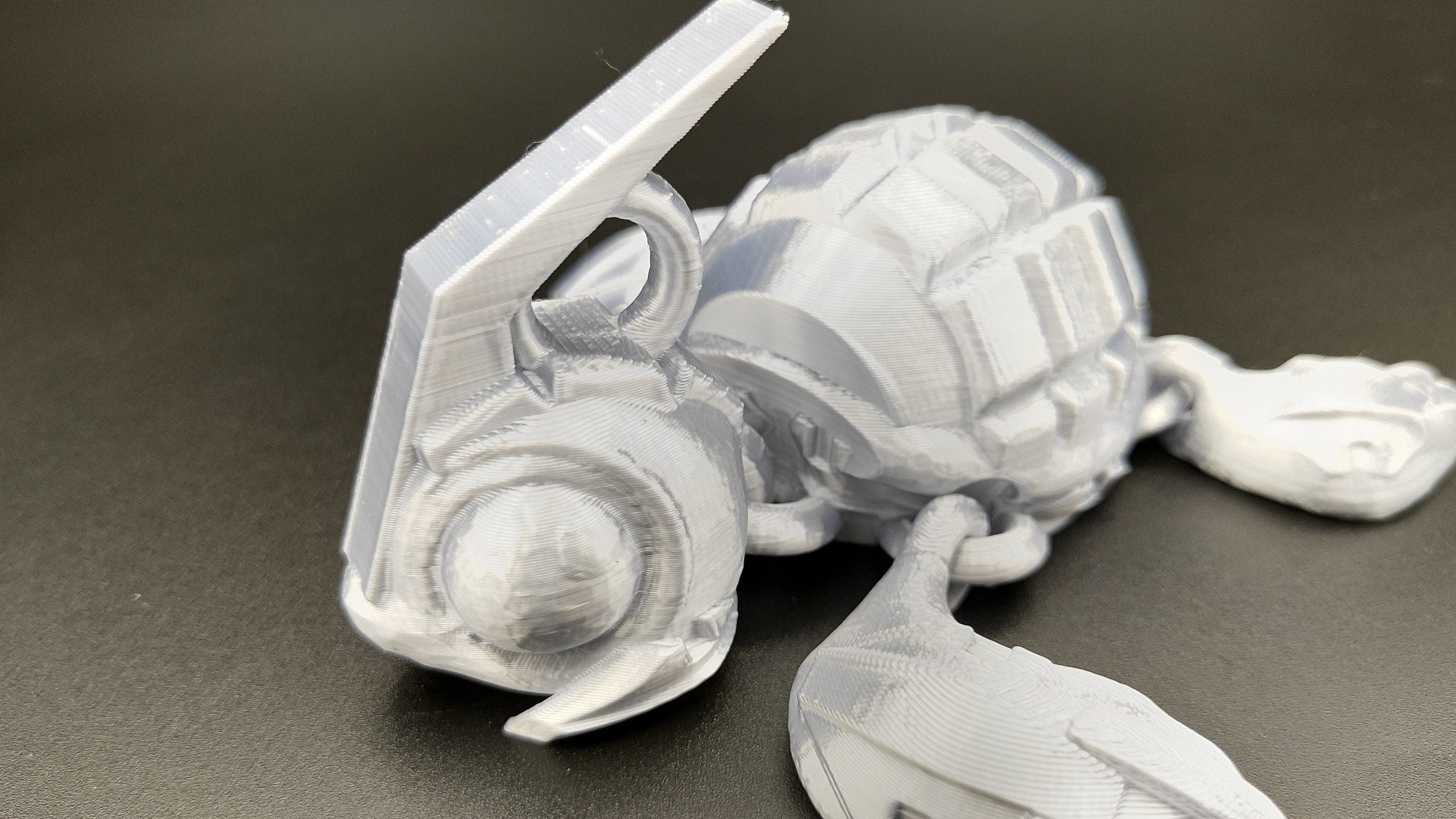 Silver Color Grenurtle, grenade / turtle 3d printed (made) adult desk fidget toy. Sensory turtle buddy.