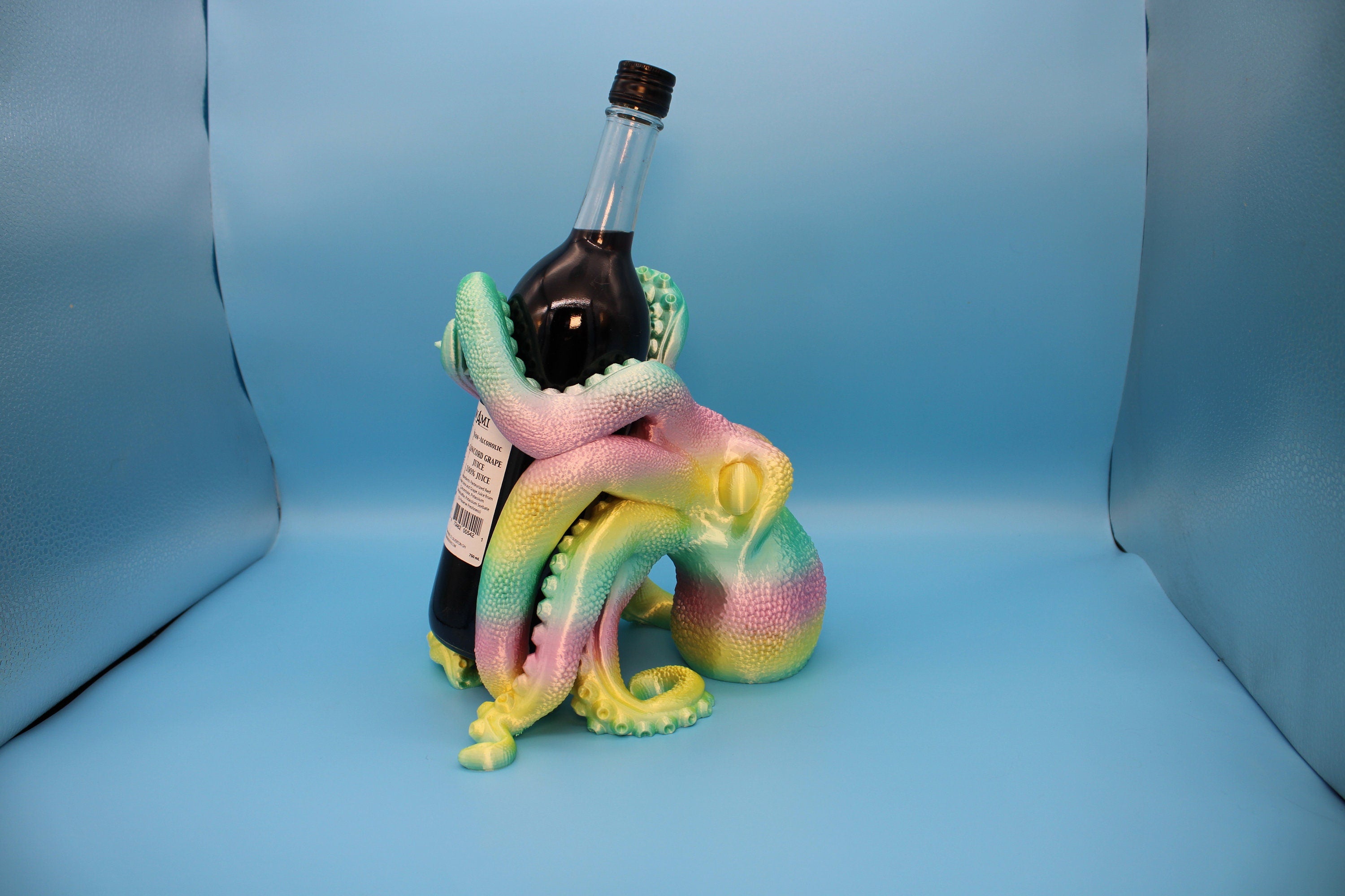 Rainbow Cute Octopus | Wine Bottle Holder | Bottle Display | 3D Printed Art | Holds Wine Bottles 750ml. standard size 9.5 in. circumference.