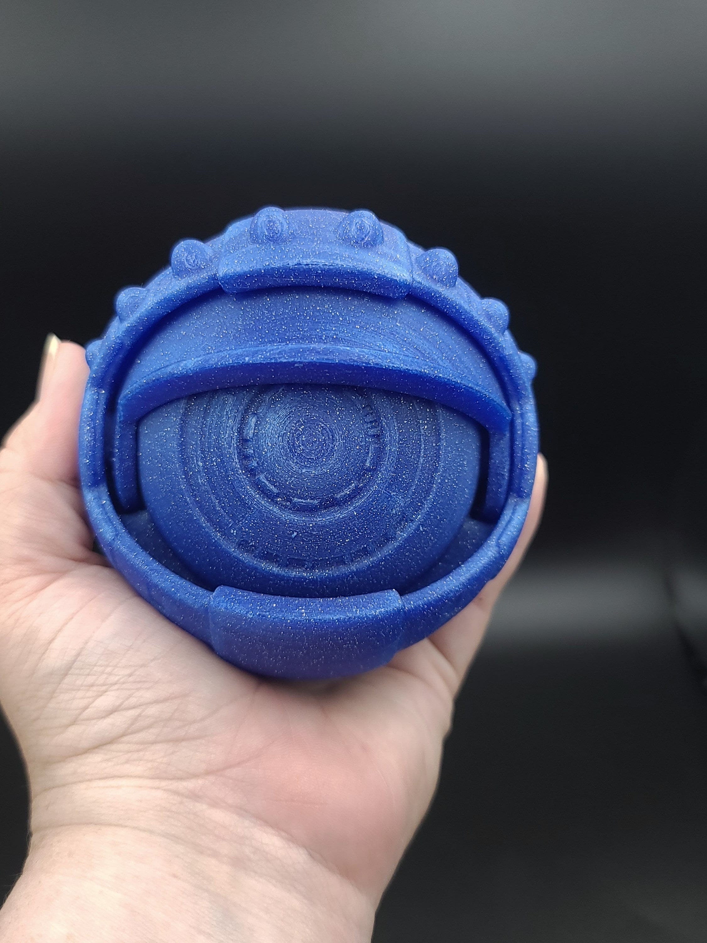 Hand Held Large Flexi Eye. Blue Sparkle Color fidget eye sensory toy. Adult desk toy.