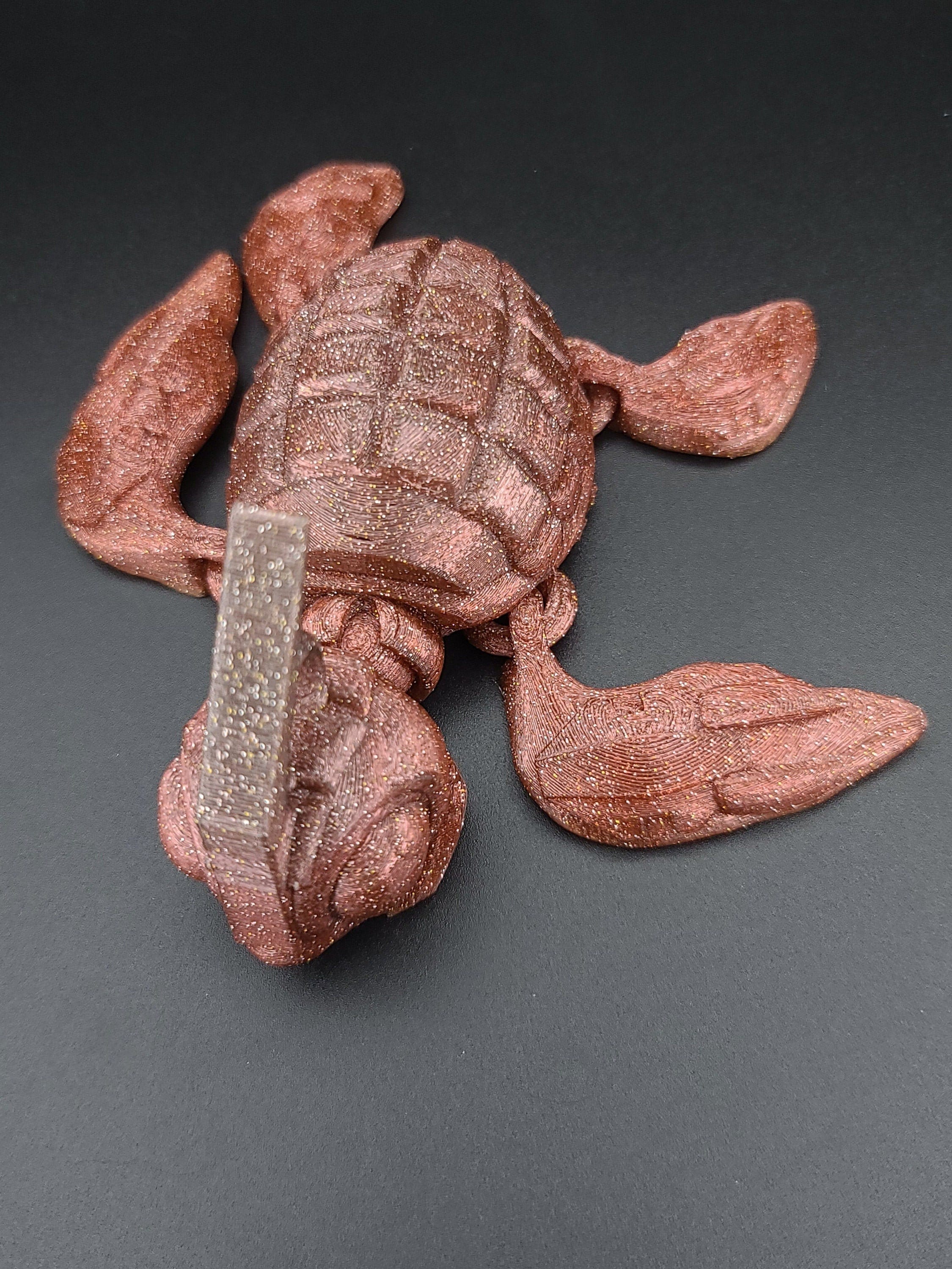 Dark red grenurtle grenade / turtle 3d printed small color change (golden bottom to red / maroon) (made) adult desk fidget toy.