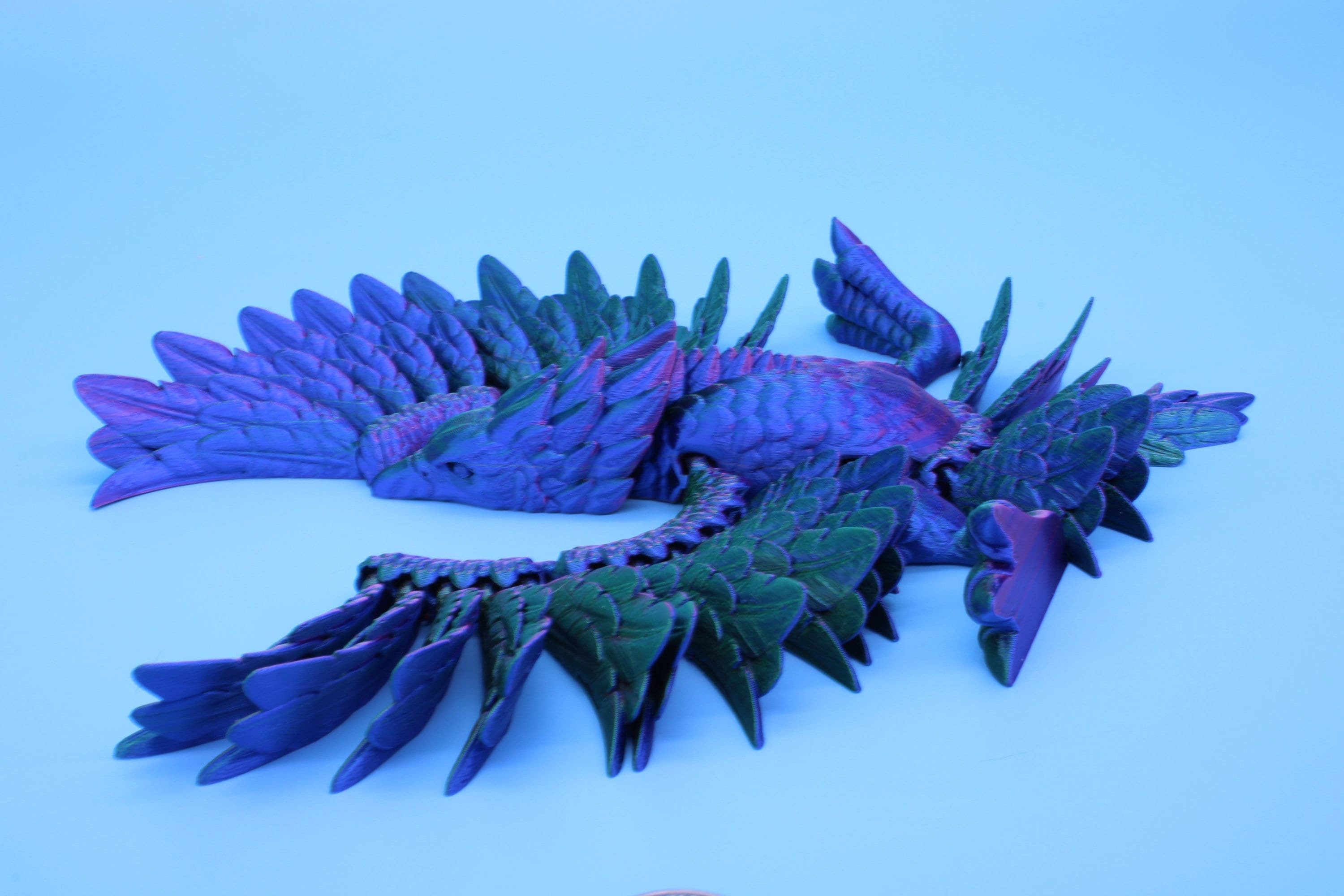 Cute Flexi Multi Color Phoenix. Unique 3D printed. Great Articulating fidget toy, desk, sensory toy. 4 inch Blue, Red, Teal, Green.