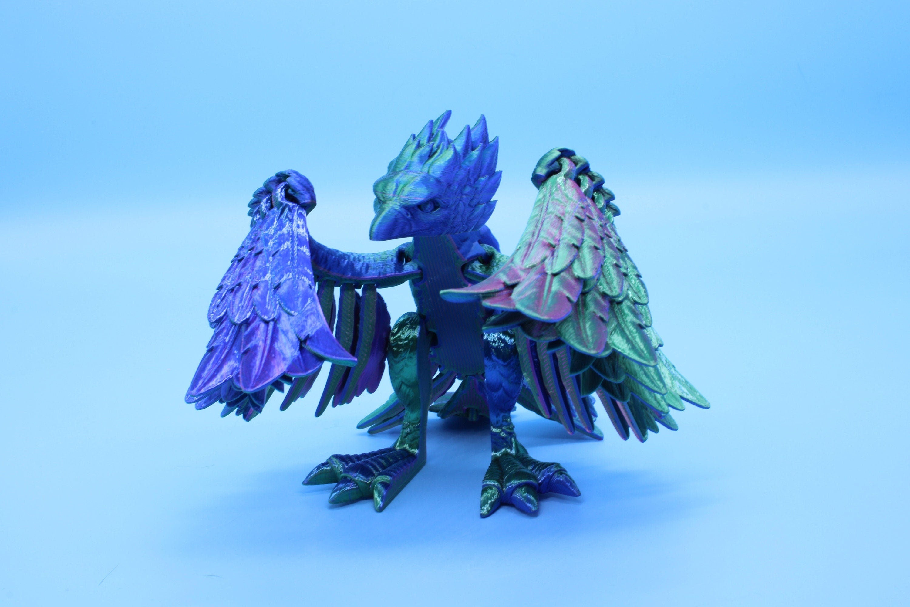 Cute Flexi Multi Color Phoenix. Unique 3D printed. Great Articulating fidget toy, desk, sensory toy. 4 inch Blue, Red, Teal, Green.