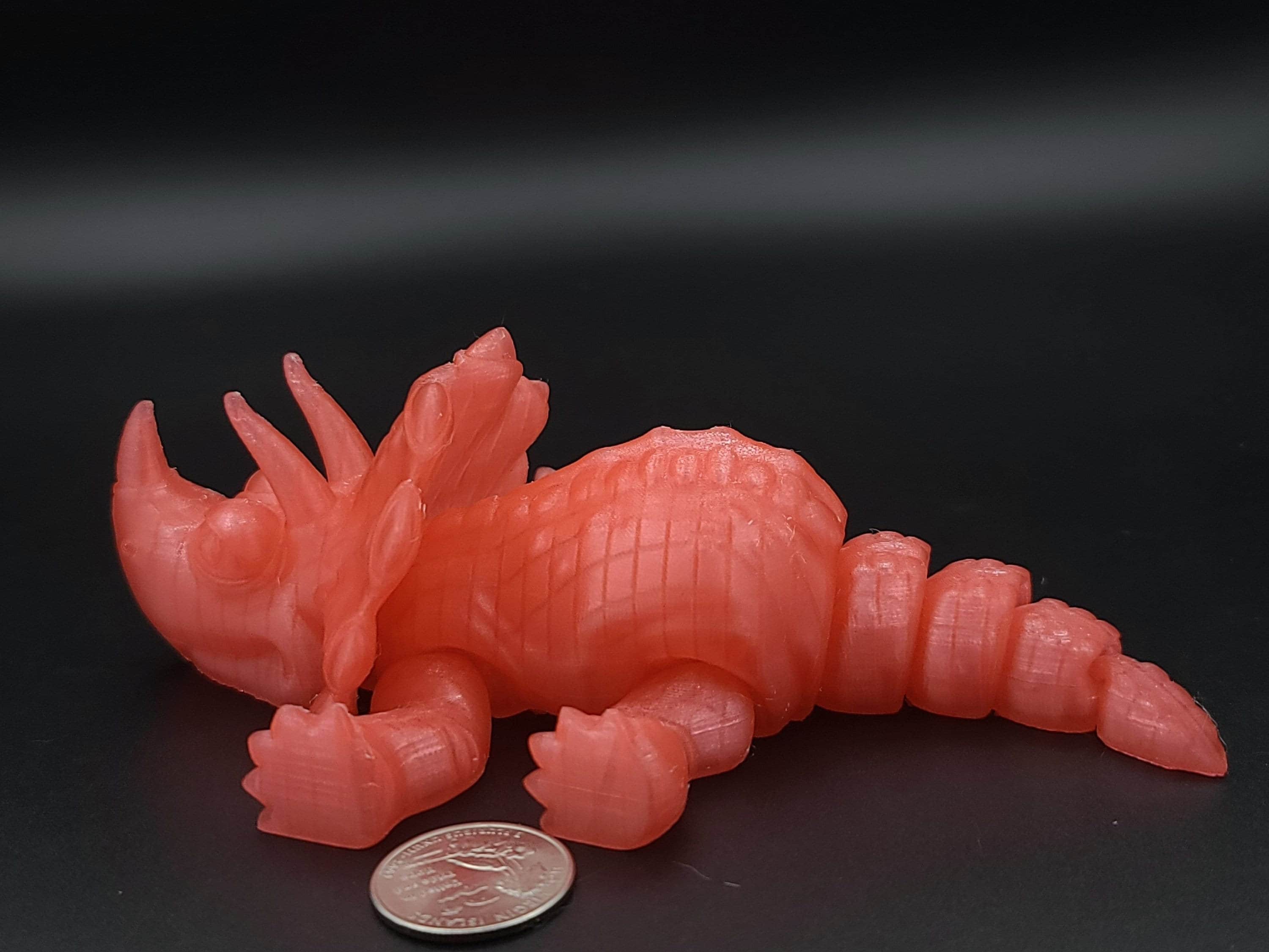 Cute Flexi Watermelon Red Translucent Triceratops. Unique 3D printed Triceratops. Great Articulating fidget toy, desk, sensory toy. 6.5 inch