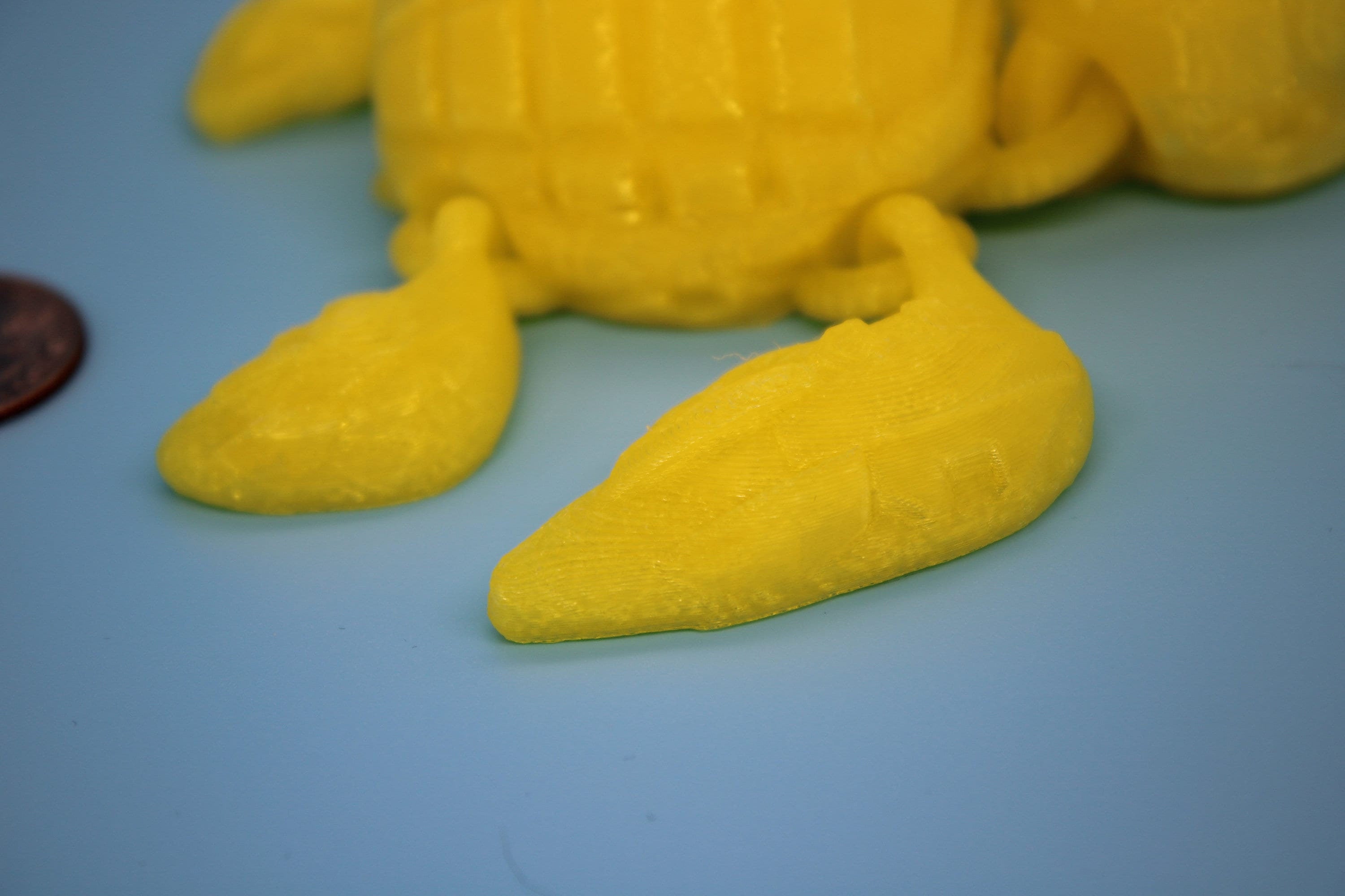 Glass Yellow Color Grenurtle, grenade / turtle 3d printed (made) adult desk fidget toy. Sensory turtle buddy.