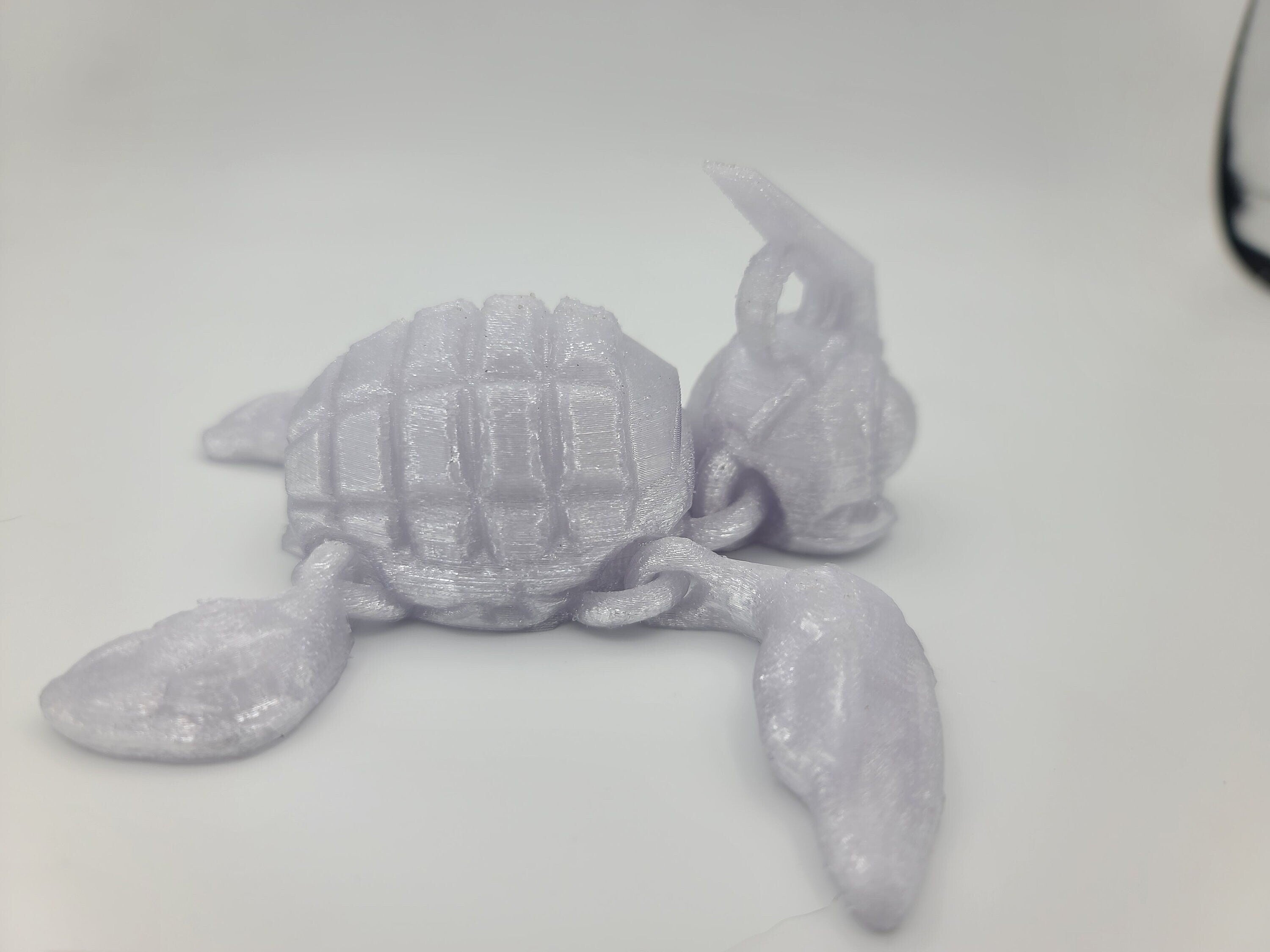 Silver shimmer turtle articulating (Grenurtle) link head. 3D printed. Flexi fidget turtle, (made) adult desk fidget toy. perfect gift