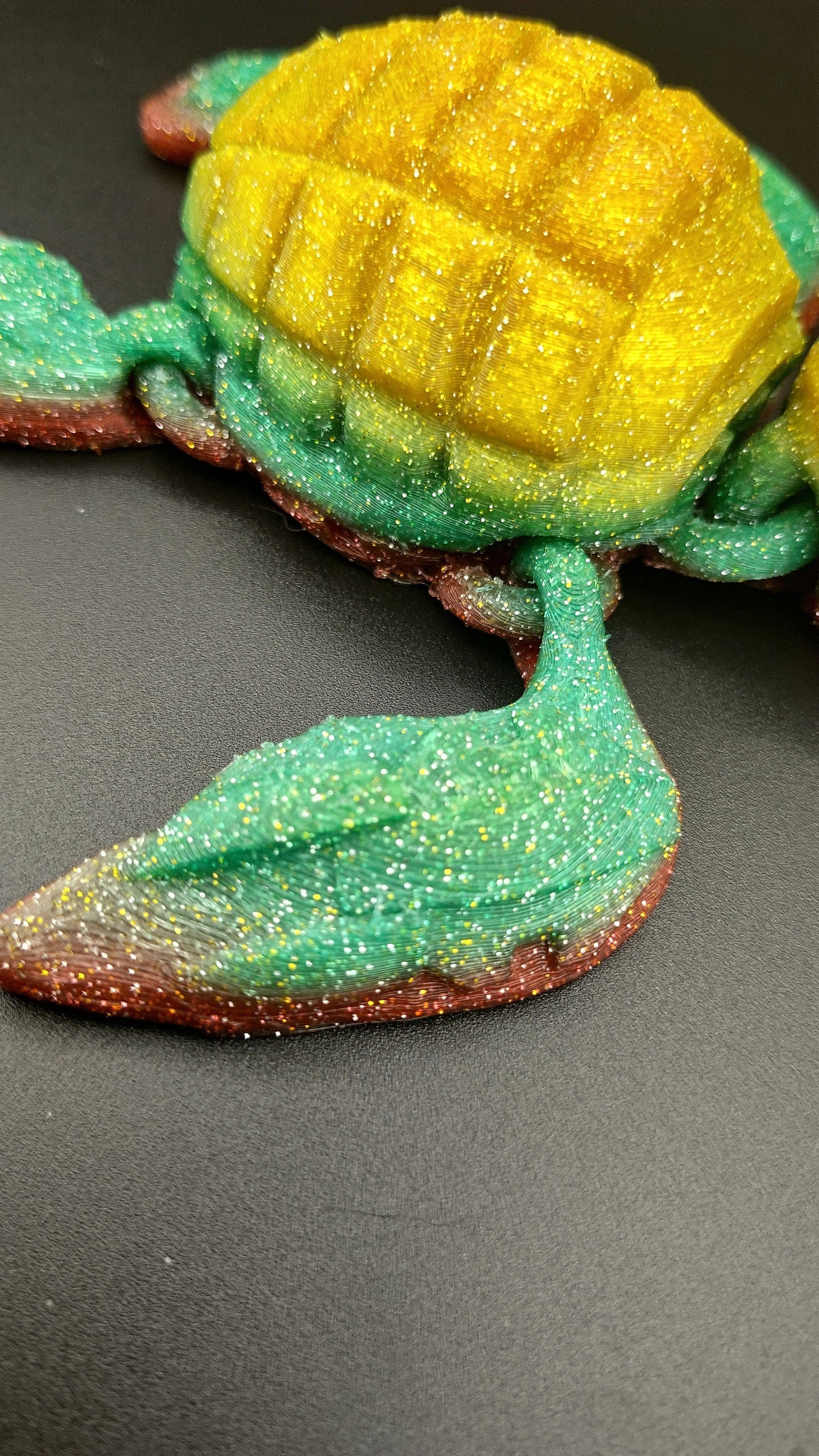 Sparkle Rainbow, (Red, Green, Yellow Gold,) Grenurtle, grenade / turtle 3d printed (made) adult desk fidget toy. Sensory turtle buddy.