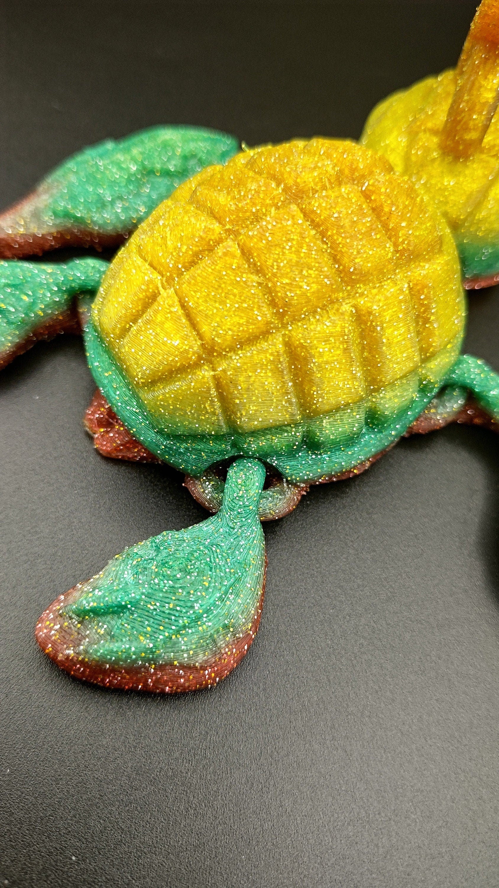 Sparkle Rainbow, (Red, Green, Yellow Gold,) Grenurtle, grenade / turtle 3d printed (made) adult desk fidget toy. Sensory turtle buddy.