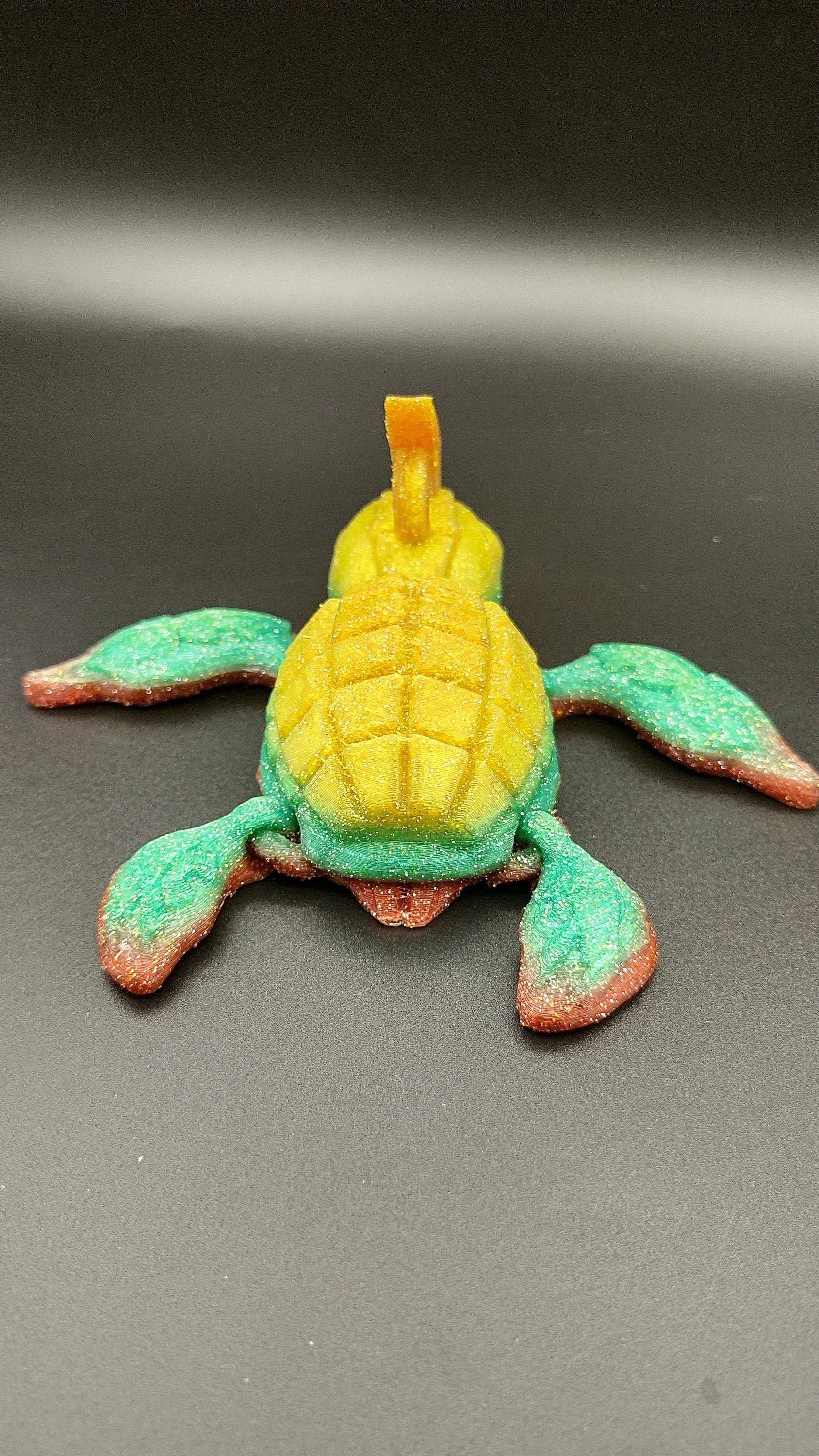 Sparkle Rainbow, (Red, Green, Yellow Gold,) Grenurtle, grenade / turtle 3d printed (made) adult desk fidget toy. Sensory turtle buddy.