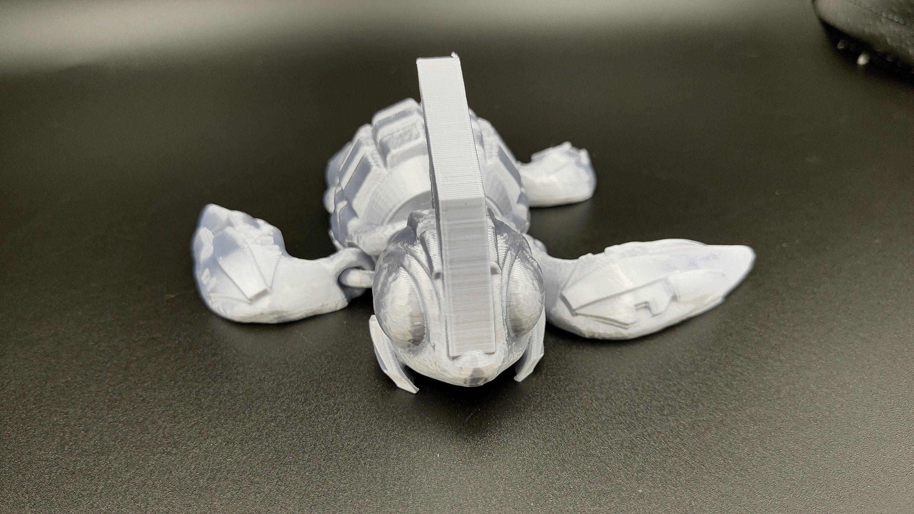 Silver Color Grenurtle, grenade / turtle 3d printed (made) adult desk fidget toy. Sensory turtle buddy.